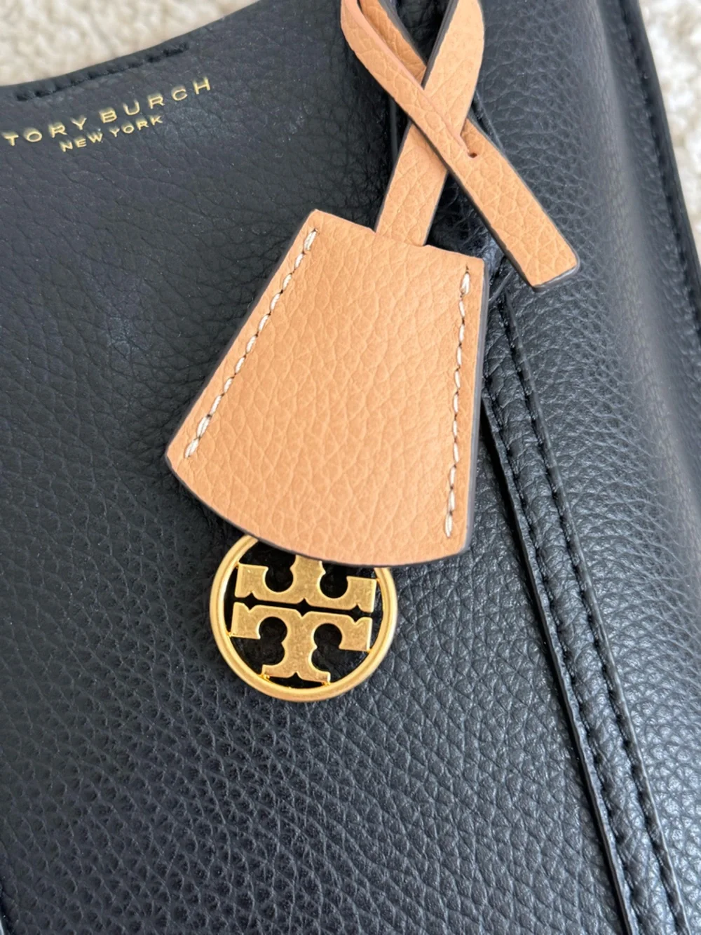 Tory Burch Perry Black Pebbled Leather Mini Crossbody with Tan Charm